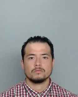 Mugshot of JUAN J CARRIZALES