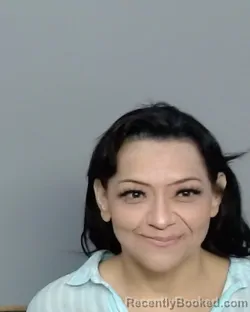 Mugshot of April Marie Escobedo booked in Nueces County, Texas on August 26, 2026