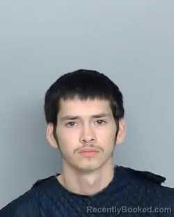 Mugshot of ETHAN ADRIAN SUAREZ booked in Nueces County, Texas on April 21, 2026