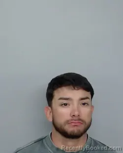 Mugshot of CRIZTIAN ALBERTO DELGADO booked in Nueces County, Texas on May 3, 2026