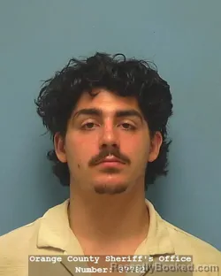 Mugshot of Paxton Alexander Vasquez booked in Orange County, Texas on August 22, 2026