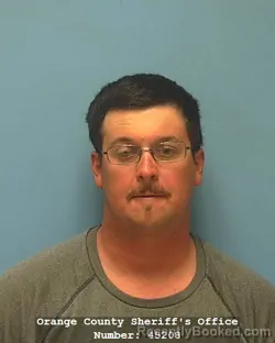 Mugshot of TRAVIS JAMES DUPUY booked in Orange County, Texas on August 3, 2026