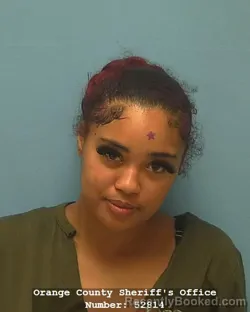 Mugshot of Briasia Anari Delahoussaye booked in Orange County, Texas on August 23, 2026