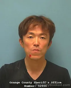Mugshot of MASASHI OKABE booked in Orange County, Texas on July 2, 2026
