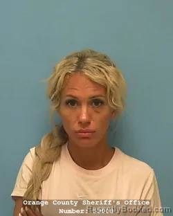 Mugshot of HEATHER MARIE HENSON booked in Orange County, Texas on July 4, 2026