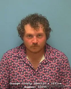 Mugshot of ASHTON RAY HOGAN booked in Orange County, Texas on July 11, 2026