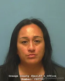 Mugshot of TITAINA KALEINANI TAUOTAHA booked in Orange County, Texas on May 22, 2026