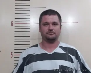 Mugshot of DEVON JOHN HORNECK