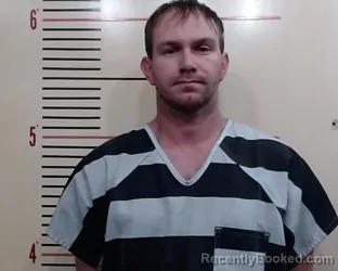 Mugshot of Christopher Tommy Hill booked in Parker County, Texas on March 11, 2026