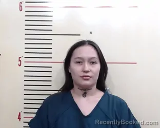 Mugshot of ELIZABETH ESTHER BARKER booked in Parker County, Texas on March 13, 2026