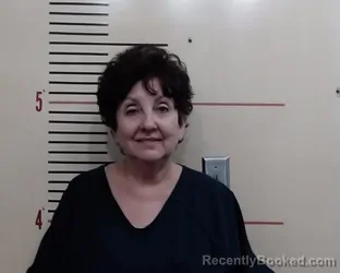 Mugshot of JUNE ANN BROWN booked in Parker County, Texas on March 15, 2026