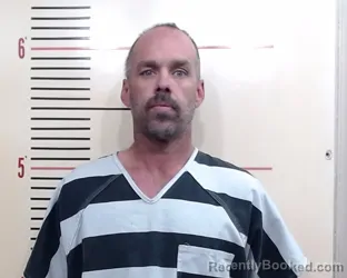 Mugshot of Adam John Ellis booked in Parker County, Texas on March 18, 2026