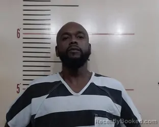 Mugshot of DEMARKUS DEVORUEX COOPER booked in Parker County, Texas on March 30, 2026