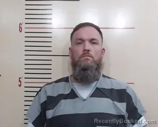 Mugshot of Micah Evan Bewley booked in Parker County, Texas on April 2, 2026