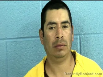 Mugshot of JUAN TINO COJ