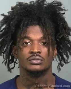 Mugshot of CORNELIUS KINTA BOOKER