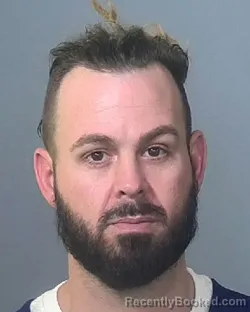 Mugshot of IAN ANTONY COLLOM booked in Manatee County, Florida on March 24, 2026