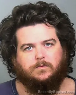 Mugshot of JUSTIN CHRISTOPHER CORKINS booked in Manatee County, Florida on April 2, 2026