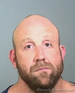 Mugshot of ANDREW LLOYD GARRISON booked in Manatee County, Florida on March 12, 2026