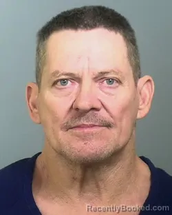 Mugshot of ROBERT E MCCOMAS