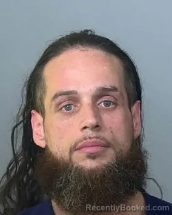 Mugshot of MICHAEL ALAN RAMOS booked in Manatee County, Florida on May 13, 2026