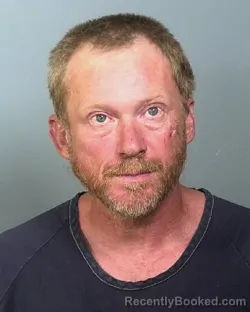 Mugshot of BENJAMIN R SLUZENSKI booked in Manatee County, Florida on March 24, 2026