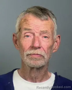 Mugshot of HARLAN GENE TENHARMSEL