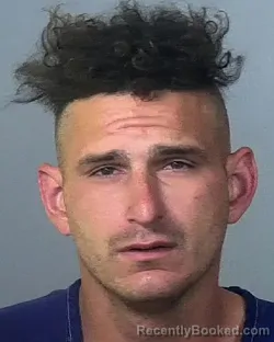 Mugshot of JUSTON DALE URSUM booked in Manatee County, Florida on March 26, 2026