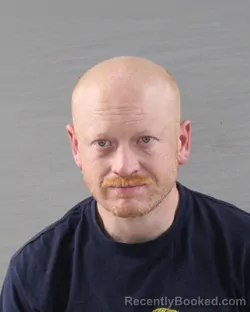 Mugshot of JUSTIN LEE WAYNE THOMAS