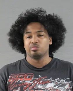 Mugshot of DAVADJAE MEOSHREL VASQUEZ