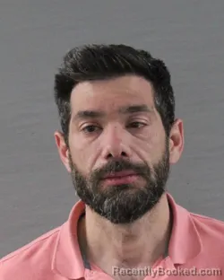 Mugshot of JUSTIN PAUL TROSTER