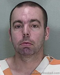 Mugshot of DUANE RUDOLPHJOHN THOMPSON