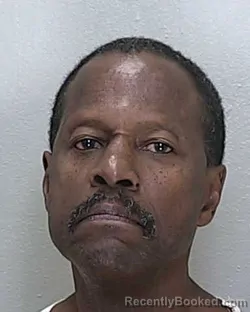 Mugshot of MICHAEL YODANDE HUGHES