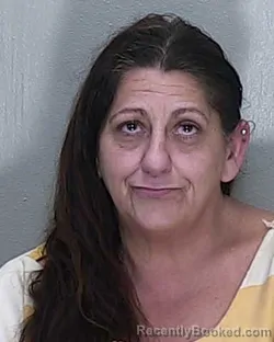 Mugshot of GLENDINA JO FLORES