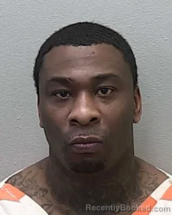 Mugshot of RESHARD CORNELIUS THOMPSON