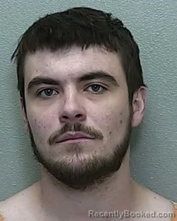 Mugshot of JAYMEN RAGO