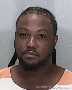 Mugshot of Charles Courtley Quashie booked in Marion County, Florida on October 11, 2026