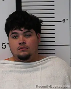 Mugshot of Isaac Marcelo Flores booked in Rockwall County, Texas on July 10, 2026