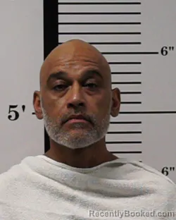 Mugshot of Gilberto Lazano Flores booked in Rockwall County, Texas on June 13, 2026