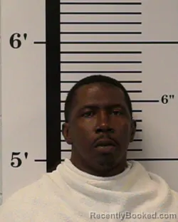 Mugshot of Marcus Ray Holbert booked in Rockwall County, Texas on August 15, 2026