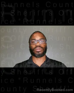 Mugshot of LARS CHINEMERE OJINNAKA booked in Runnels County, Texas on April 12, 2026