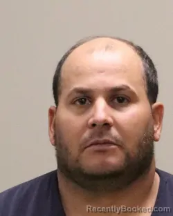 Mugshot of CARLOS FLORES-BECERRA