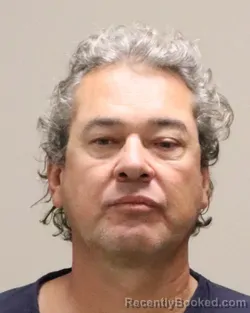 Mugshot of CARLOS ENRIQUE RESTREPO