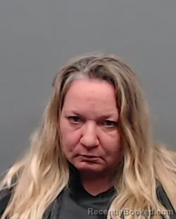 Mugshot of CRYSTAL BYERS PEACOCK booked in Smith County, Texas on June 14, 2026