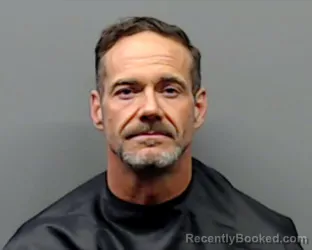 Mugshot of LEE MICHAEL RHEA booked in Smith County, Texas on April 6, 2026