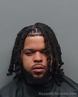 Mugshot of SANTIAGO DECHARLES JOHNSON booked in Smith County, Texas on July 26, 2026