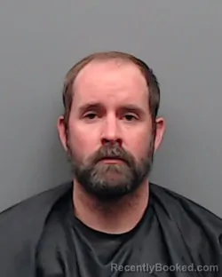 Mugshot of STEWART CHANCE BURLESON booked in Smith County, Texas on May 25, 2026