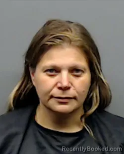 Mugshot of AMBER LYNETTE FLORES booked in Smith County, Texas on May 22, 2026