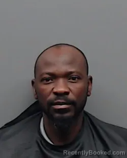 Mugshot of TOBI SEGUN AKANBI booked in Smith County, Texas on May 21, 2026