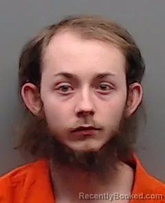 Mugshot of JOHN REYNOLDS